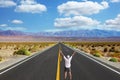 The enthusiastic tourist on great American road Royalty Free Stock Photo