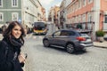 Enthusiastic traveler woman walking streets of european capital.Tourist in Lisbon,Portugal Royalty Free Stock Photo