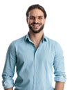 enthusiastic young man with beard and glasses looking forward and smiling Royalty Free Stock Photo