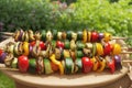 enticing grilled vegetable skewers, vibrant bell peppers, zucchini, red onion, cherry tomatoes, mushrooms