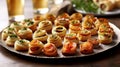 Platter of delicate puff pastry hors d\'oeuvres, filled with creamy cheese, smoked salmon, and roasted vegetables