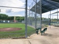 Entire baseball field with chain link fence and picnic table is empty in Dallas, Texas, USA Royalty Free Stock Photo