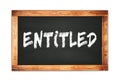 ENTITLED text written on wooden frame school blackboard