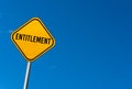 Entitlement - yellow sign with blue sky