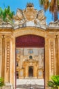 The entrance arch leading to the forecourt of the Vilhena Palace