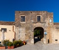 Entrance of the Baglio, courtyard in the little village of Scopello, Sicily. Italy