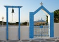 Entrance with bell to the old Greek church. Royalty Free Stock Photo