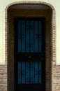 Entrance with blue and black door Royalty Free Stock Photo