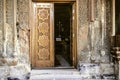 Entrance church wooden door with carved elements folk ornament