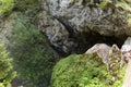 Entrance climb into the huge Devil`s Throat cave in the Rhodope Mountains