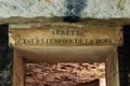 Entrance door of the catacombs of Paris, France. Text in French meaning `Stop, here is the empire of death` Royalty Free Stock Photo