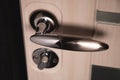 Entrance door handle close up. Lock and handle on the door Royalty Free Stock Photo