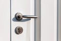 Entrance door handle close up. Lock and handle on the door Royalty Free Stock Photo