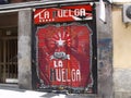 Entrance door of La Huelga bar. Madrid