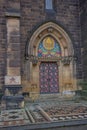 Entrance door of the neo gothic Cathedral of Saints Peter and Paul in the Visegrad Fortress, Prague.