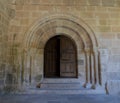Entrance door of the Romanesque collegiate church of San Martin de Elines