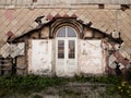 Entrance door to the old ruined building Royalty Free Stock Photo