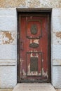 Old Monastery door in red Royalty Free Stock Photo