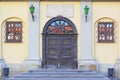 Entrance doors with coat of arms in one of the buildings of Nesvizh Castle
