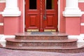 Entrance double door with glass and threshold with marble steps. Royalty Free Stock Photo