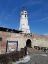 Entrance entry tower of belgrade castle fortress bridge wood snow winter melting blue serbia travel tourist park east Royalty Free Stock Photo