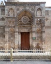 Entrance of Fatimid era Aqmar Mosque, with lavish decoration across the entire facade, Muizz Street, Cairo, Egypt