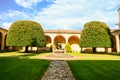 The entrance garden with an old well of the