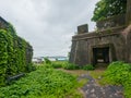 Entrance Gate Of Old Abandoned Sewri Fort Made Of Stone With The Views Of Trans Harbor Link Bridge Construction, Mumbai