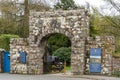 Entrance gate to Muncaster Castle, a popular tourist attraction in Ravenglass, The Lake District, UK