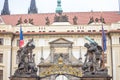 Entrance gate to the Prague Castle Prazsky Hrad, with a detail on the statues of the Wrestling giants Royalty Free Stock Photo