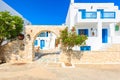 Entrance gate to typical Greek style apartment complex in Naoussa town on Paros island, Greece Royalty Free Stock Photo