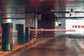 Entrance gate to underground garage parking lot, auto park interior inside Royalty Free Stock Photo