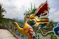 The entrance gate of Xuan Zang Temple at Sun Moon Lake, Taiwan, exudes grandeur with intricate carvings and vibrant colors,