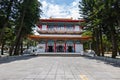 The entrance gate of Xuan Zang Temple at Sun Moon Lake, Taiwan, exudes grandeur with intricate carvings and vibrant colors,