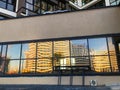 Entrance group to the entrance. glass decoration of building. panoramic windows in which light is reflected. plexiglass. stylish