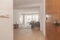 entrance hall of a house with light wooden door, light oak flooring, Royalty Free Stock Photo