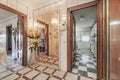 Entrance hall of a house with sapele doors, many mirrors Royalty Free Stock Photo