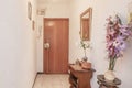 Portal of a residential building with terrazzo stairs