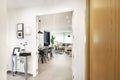 Entrance hall and living room with light stoneware floors, white carpentry,