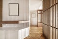 Entrance hall of a modern house with minimalist contemporary design wooden furniture, a wooden slat trellis and herringbone oak