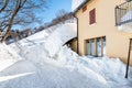 Entrance of the house hidden under the snow. Royalty Free Stock Photo