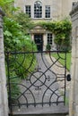 Gate and Garden Path of a Beautiful Old House Royalty Free Stock Photo