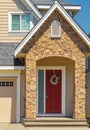 Entrance of a luxury house with a porch on a bright, sunny day in Vancouver, Canada House front door Royalty Free Stock Photo