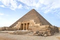 entrance of the mastaba of Seshemnufer IV late 5th Dynasty and the Great Pyramid in background. The Pyramid Fields from Giza to Royalty Free Stock Photo