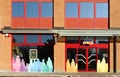 Entrance and multicolored window of DM store, Drogerie Markt. It is a german shop chain selling cosmetics, household products,heal