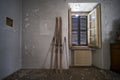 entrance with old wooden skis in abandoned house