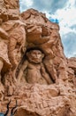 Entrance of The Palace / Lost City /Sun City with stone statues under blue and cloudy sky