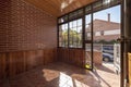 Entrance porch to a single-family house covered in wood Royalty Free Stock Photo