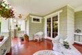 Entrance porch with wicker chairs and glass door Royalty Free Stock Photo