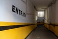 The entrance of a Private Car Garage with the italian word Entrata that means Entry on Blurred Background